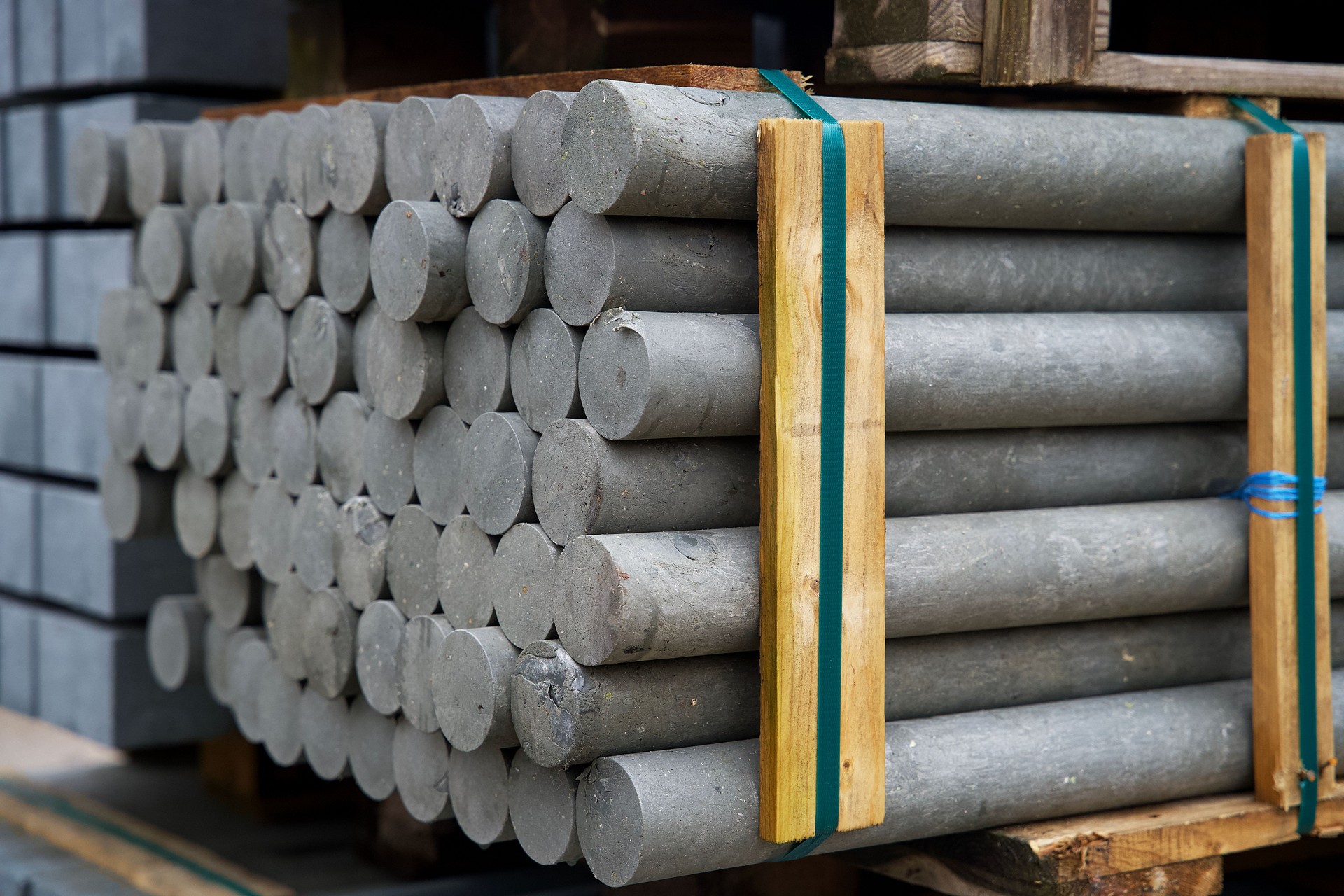 Stack of circular round posts made of plastic residual mix waste